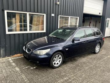 BMW 523i (lage km stand en panoramadak) beschikbaar voor biedingen
