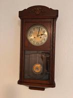 Antieke pendule klok, Ophalen