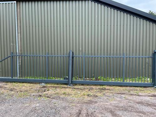 Electrische vrijdragende schuifpoort 10.3m vrije doorgang 8m, Tuin en Terras, Tuinhekken en Hekwerk, Zo goed als nieuw, Spijlenhekwerk