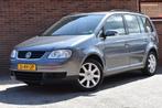 Volkswagen Touran 1.6-16V FSI Trendline Clima Cruise, Stof, Zwart, 4 cilinders, Origineel Nederlands