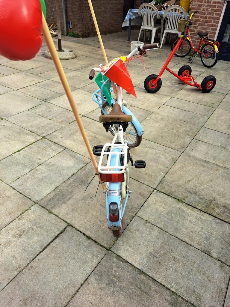 Club B kinderfiets, Ophalen