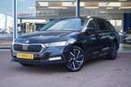 Skoda Octavia Combi 1.4 TSI iV PHEV Business Edition Automaa, Auto's, Skoda, Stof, Gebruikt, 150 pk, Zwart