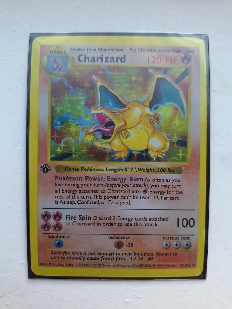 Charizard 4 first edition base set, Hobby en Vrije tijd, Verzamelkaartspellen | Pokémon, Zo goed als nieuw, Ophalen of Verzenden