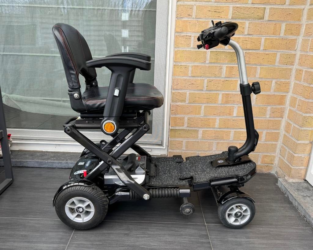 Bijna nieuwe lichtgewicht scootmobiel mango bobby carbon, Ophalen of Verzenden, Zo goed als nieuw