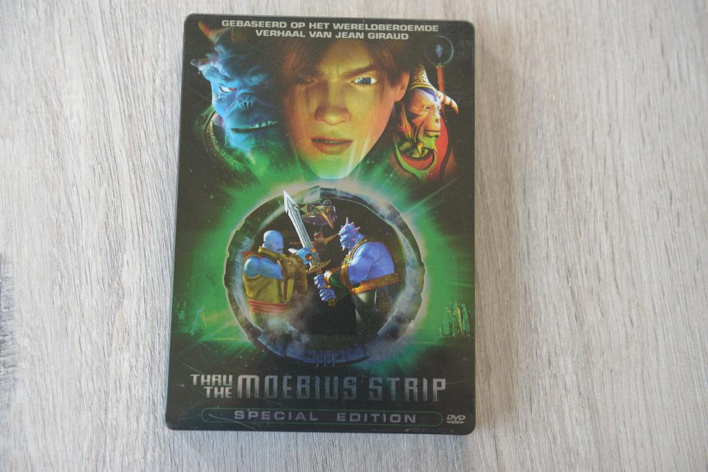 THRU THE MOEBIUS STRIP == SPECIAL METAL CAN EDITION, Vanaf 16 jaar, Verzenden, Zo goed als nieuw