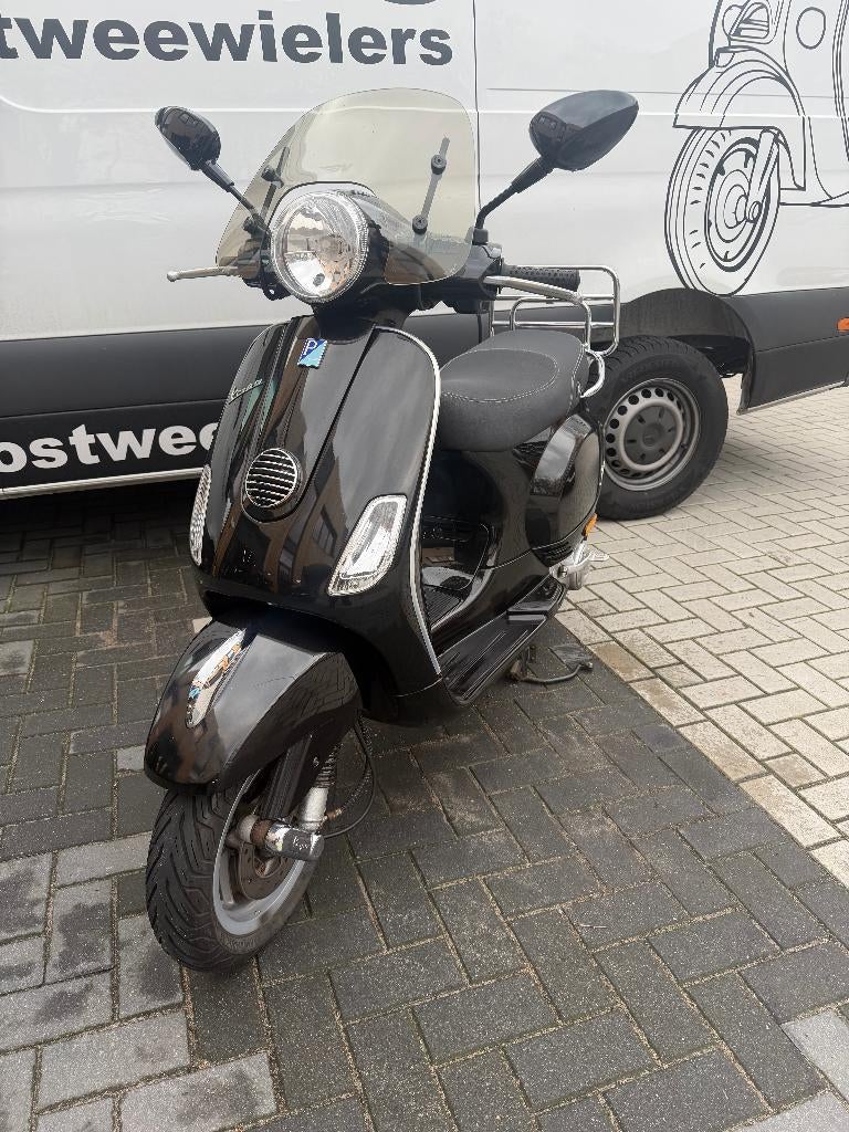 Vespa LX 2010 4t4v | Nette staat | Garantie | Glans zwart, Fietsen en Brommers, Scooters | Vespa, Gebruikt, Maximaal 45 km/u, Ophalen of Verzenden