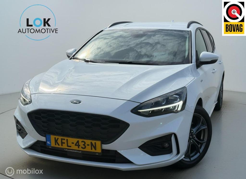 Ford Focus Wagon 1.5 EcoBoost ST Line Business LED|HUD|B&O|, Auto's, Ford, 1345 kg, 181 pk, Alcantara, Wit