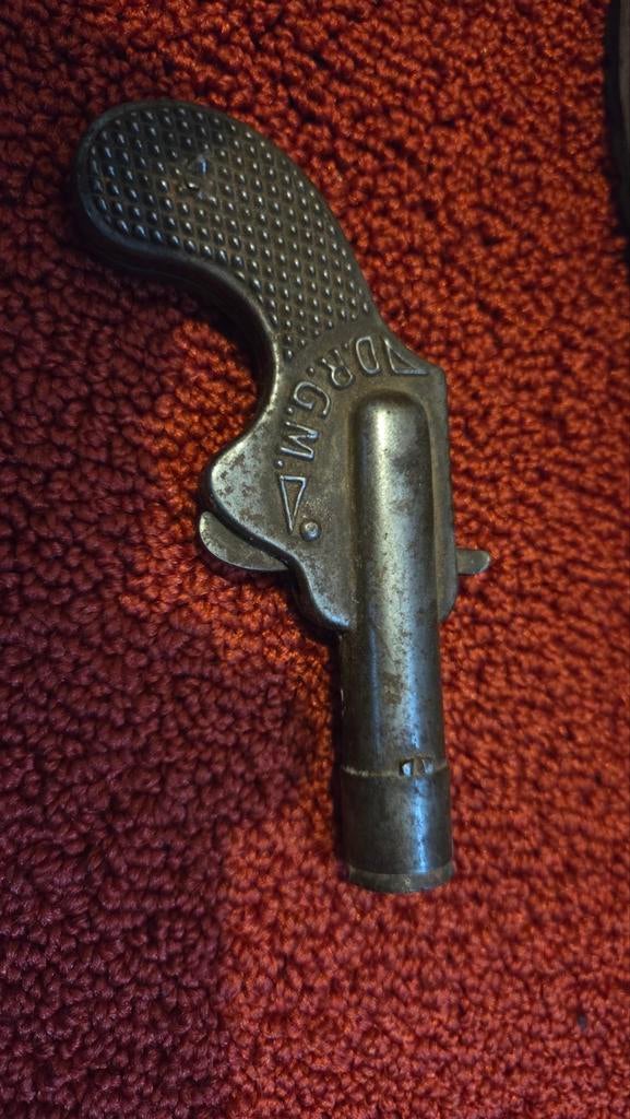 Kinderspeelgoed knalkurkpistool lodi d.r.g.m., Ophalen of Verzenden, Landmacht, Nederland