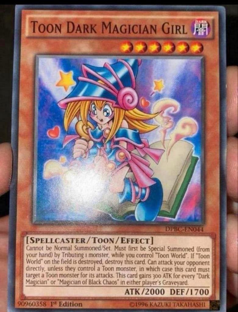 Yu-Gi-Oh! Toon Dark Magician Girl DPBC 1st Edition !, Hobby en Vrije tijd, Verzamelkaartspellen | Yu-gi-Oh!, Ophalen of Verzenden