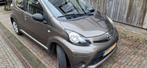 Toyota Aygo 1.0 12V Vvt-i 5DRS 2013 Bruin, Auto's, Voorwielaandrijving, Bruin, 4 stoelen, Origineel Nederlands
