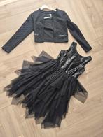 Zwarte bling bling jurk met jasje maat 134, Ophalen of Verzenden, Meisje, Jurk of Rok