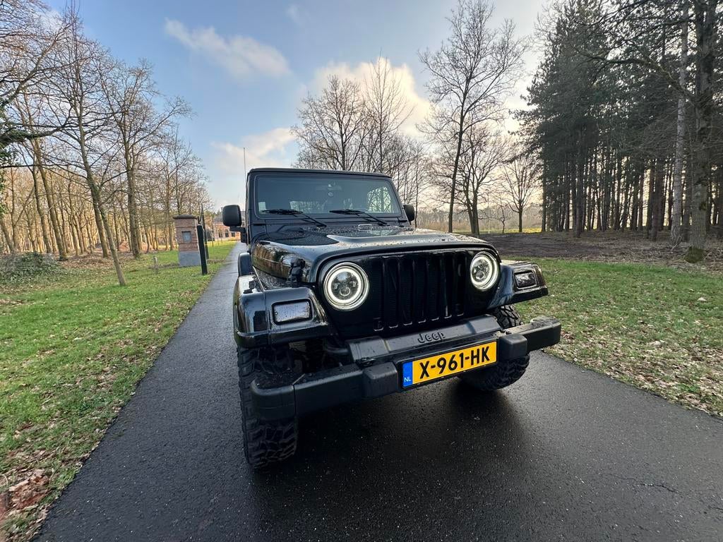 Jeep Wrangler 4.0 Limited Automaat 2006 Hardtop & Softtop, Auto's, Jeep, Automaat, Stoelverwarming, 450 kg, 4 stoelen