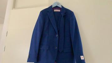 Kostuum kind, 2x, licht blauw en konings blauw mt. 134/140. beschikbaar voor biedingen