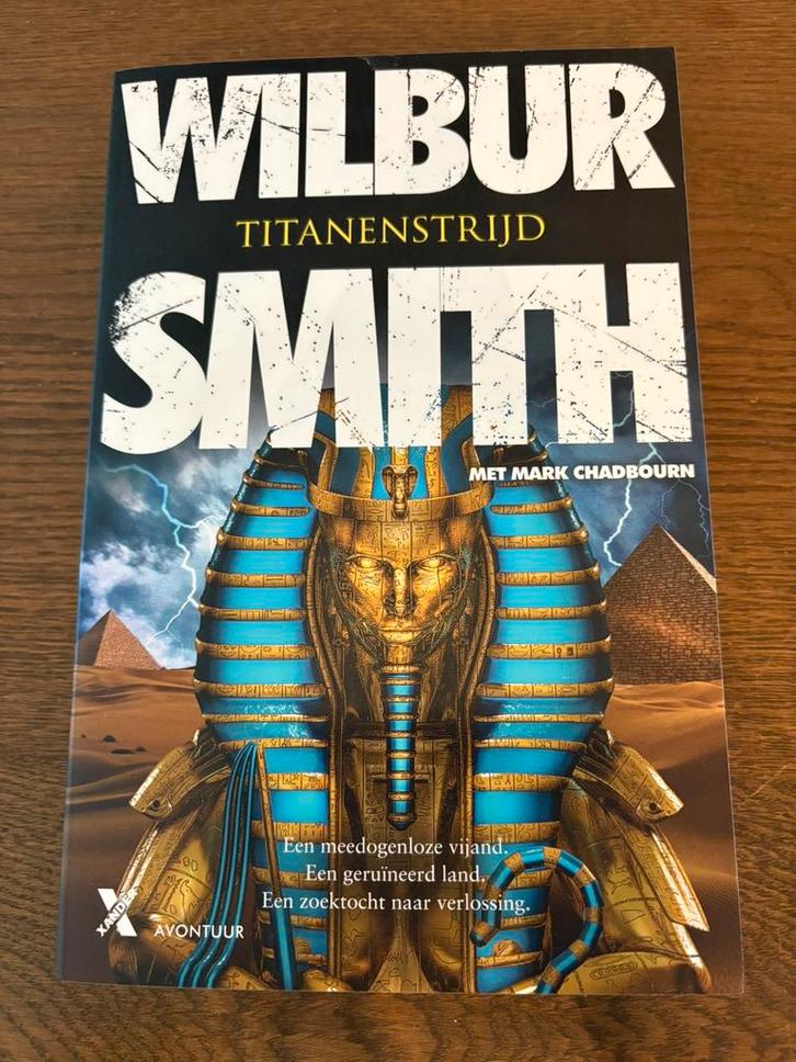 Wilbur Smith - Titanenstrijd, Boeken, Thrillers, Zo goed als nieuw, Ophalen of Verzenden