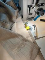 Professioneel inkorten en vermaken van gordijnen en kleding