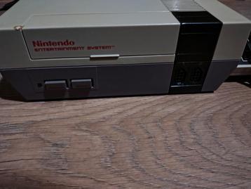 Nintendo nes met 8 spellen. beschikbaar voor biedingen
