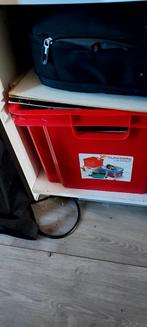 Krat met elpees, Ophalen