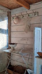 Regaal kapstok (nuzzelspul), Ophalen