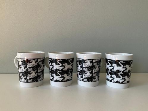M.C. Escher beker met oor (4), porselein, Douwe Egberts, Huis en Inrichting, Keuken | Servies, Zo goed als nieuw, Kop(pen) en/of Schotel(s)