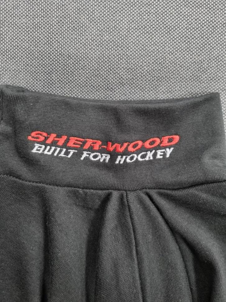 IJshockey Onesies Vier stuks Kindermaat tot  135 cm., Sport en Fitness, IJshockey, Gebruikt, Kleding, Ophalen of Verzenden