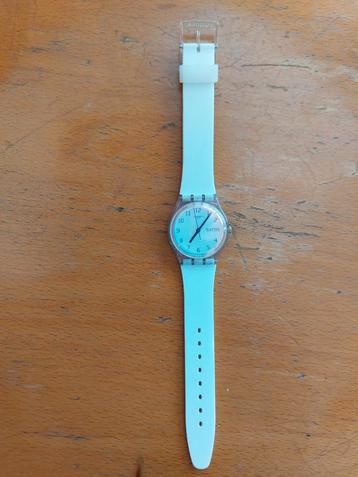 Swatch horloge lichtblauw parelmoer beschikbaar voor biedingen