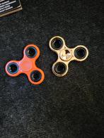 2 fidget spinners Oranje en goudkleurig, Ophalen of Verzenden, Zo goed als nieuw