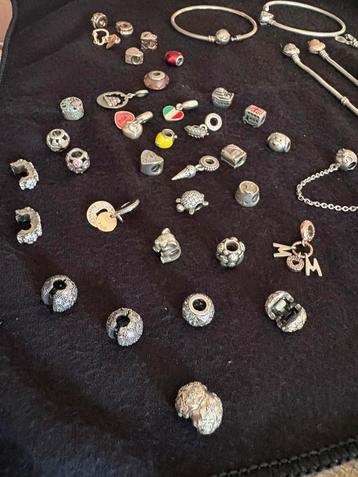 Pandora bedels, clips en armbanden beschikbaar voor biedingen