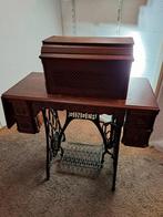 antieke staande ijzer-hout naaimachine Singer, Ophalen