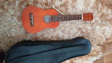 Ukelele zo goed als nieuw met reistas beschikbaar voor biedingen
