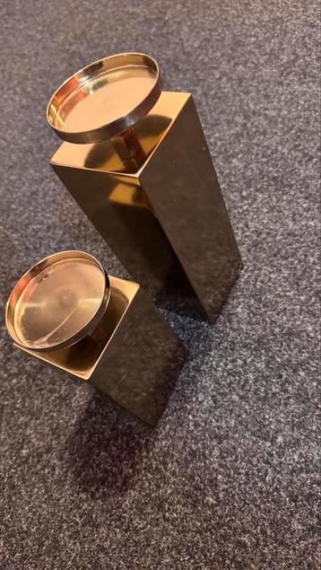2 H&M gouden kandelaars beschikbaar voor biedingen