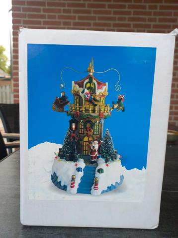 Kerstdorp draaimolen carrousel  beschikbaar voor biedingen