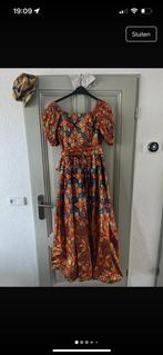 Hele mooie hangemaakte afrikaanse jurk vlisco, Ophalen of Verzenden, Zo goed als nieuw, Maat 38/40 (M), Overige typen