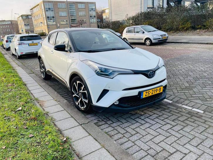 Toyota C-HR 1.8 Hybrid 122pk CVT 2019 Wit, Auto's, Toyota, Particulier, C-HR, ABS, Achteruitrijcamera, Adaptive Cruise Control