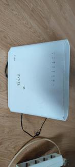 Zyxel T-50 + Sitecom Switch - Complete Set, Ophalen of Verzenden, Gebruikt, Router met modem, Zyxel