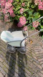 Antieke poppenwandelwagen jaren 50, Ophalen