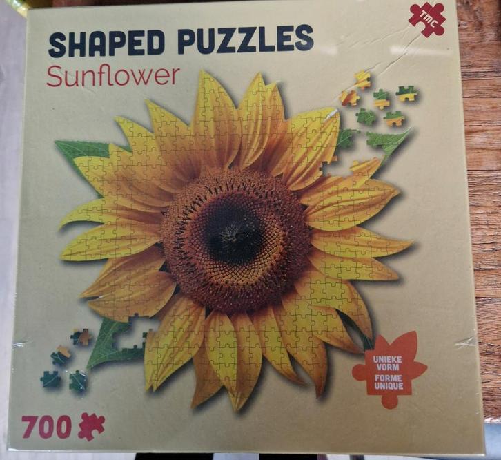 Zonnebloem Legpuzzel - 700 stukjes. "Shaped puzzle"., Hobby en Vrije tijd, Denksport en Puzzels, Nieuw, Legpuzzel, 500 t/m 1500 stukjes