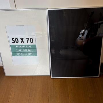2 fotolijsten 50x70 beschikbaar voor biedingen