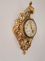 Antieke vergulde wandklok, Ophalen