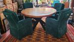 Ronde eettafel met vier groene stoelen op wieltjes., Huis en Inrichting, Complete eetkamers, Ophalen, Zo goed als nieuw, 4 tot 6 stoelen