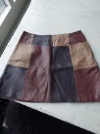 Vintage look lederen mini rok, maat 40, Kleding | Dames, Rokken, Maat 38/40 (M), Zwart, Ophalen of Verzenden, Zo goed als nieuw