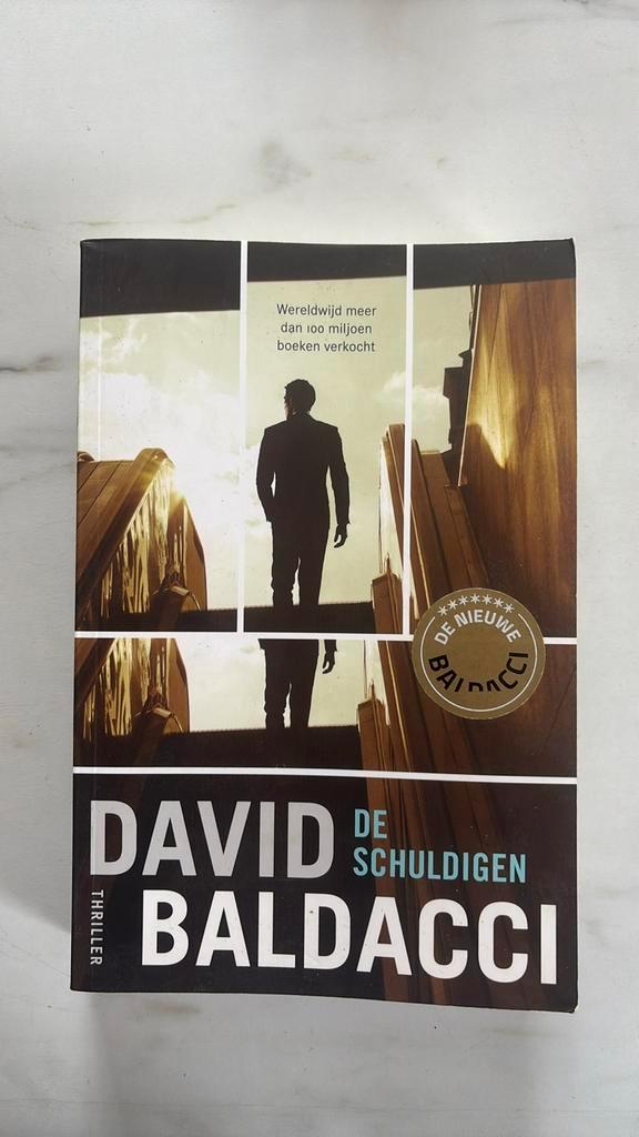 David Baldacci - De schuldigen, Boeken, Thrillers, Zo goed als nieuw, Amerika, Ophalen of Verzenden
