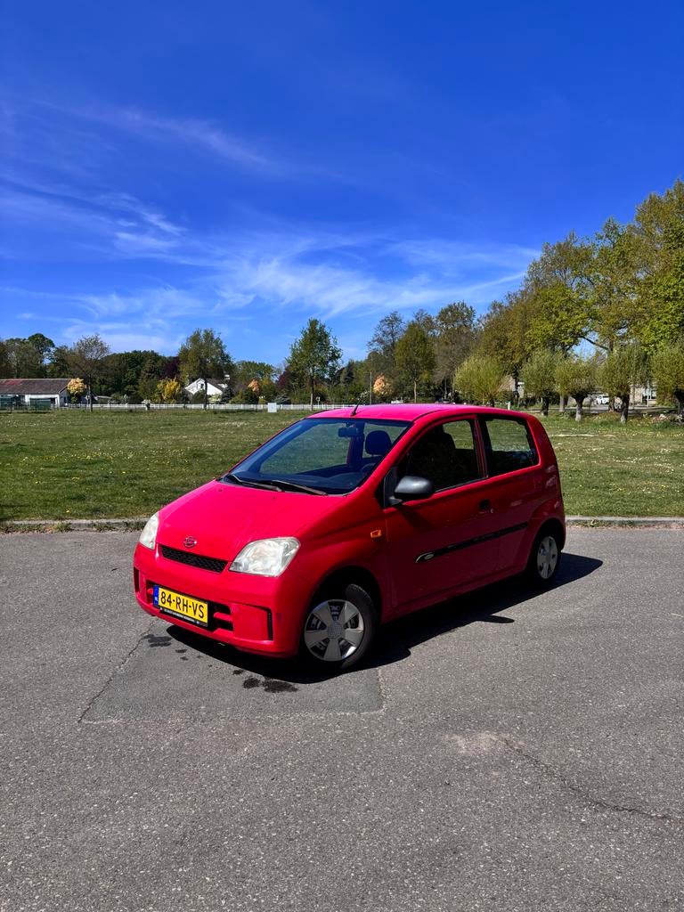 Daihatsu Cuore 1.0 Osaka 2005 Rood | APK | DEALER | 1E EIG |, Auto's, Voorwielaandrijving, 600 kg, 18 €/maand, Cuore