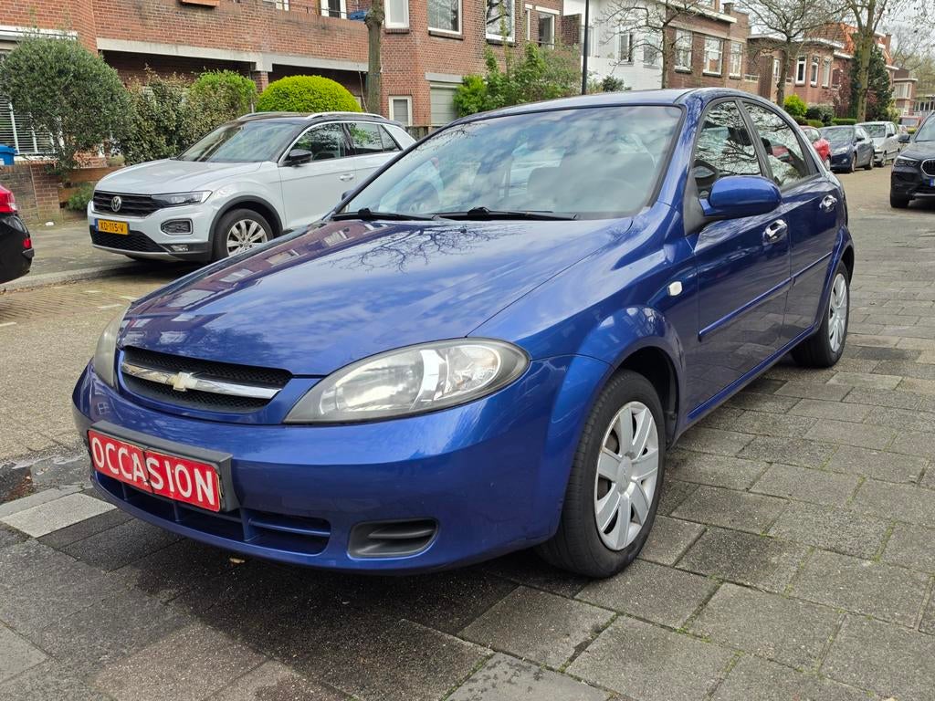Chevrolet Lacetti 1.4 - 2008 - Airco - 5drs - 103.000 NAP, Auto's, Voorwielaandrijving, 1145 kg, Blauw, 49 €/maand