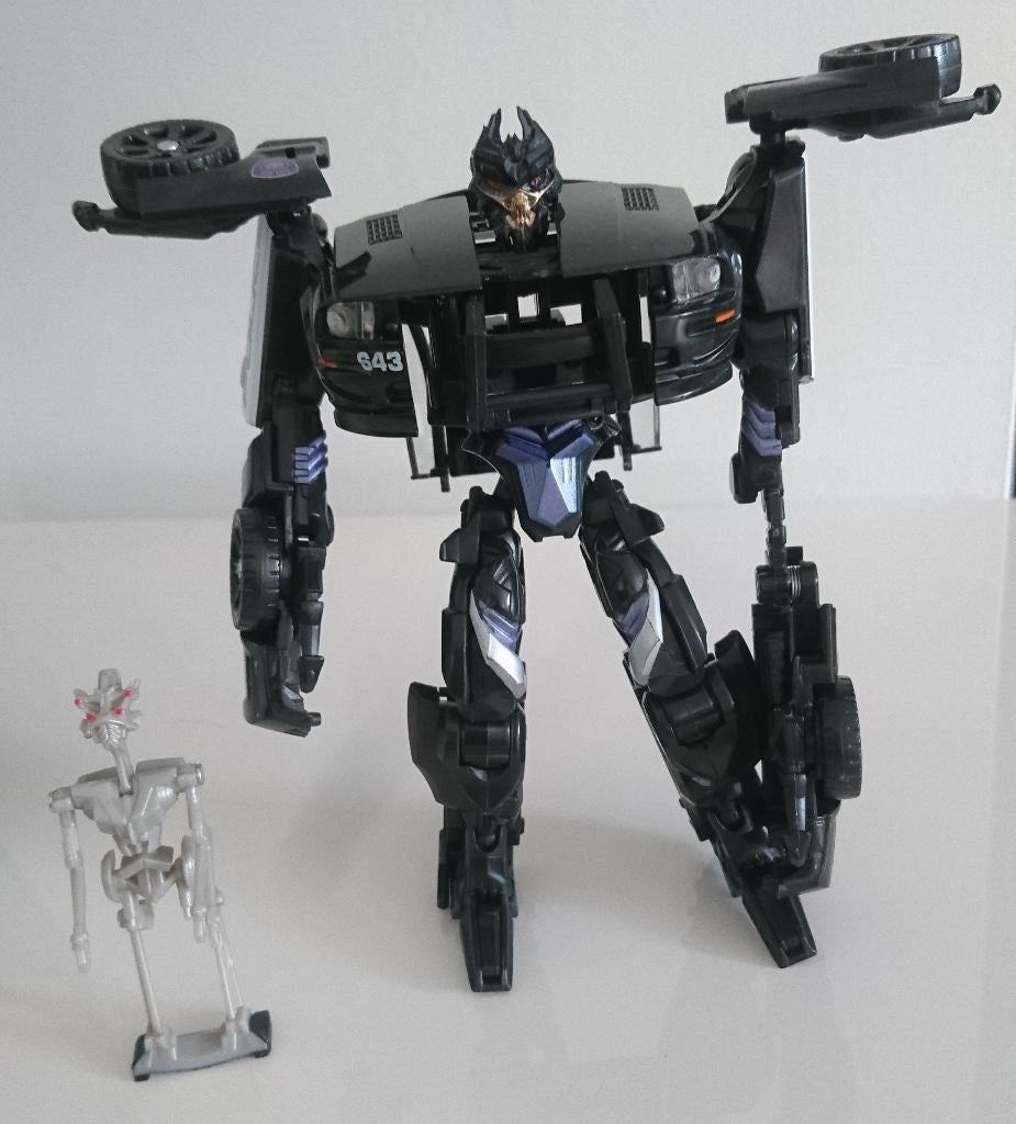 Transformers Movie Barricade met Frenzy deluxe class, Verzamelen, Transformers, Overige generaties, Ophalen of Verzenden, Zo goed als nieuw