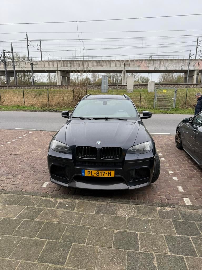 BMW X6 4.4 M AUT 2009 Zwart, Auto's, Automaat, Zwart, Vierwielaandrijving, Particulier