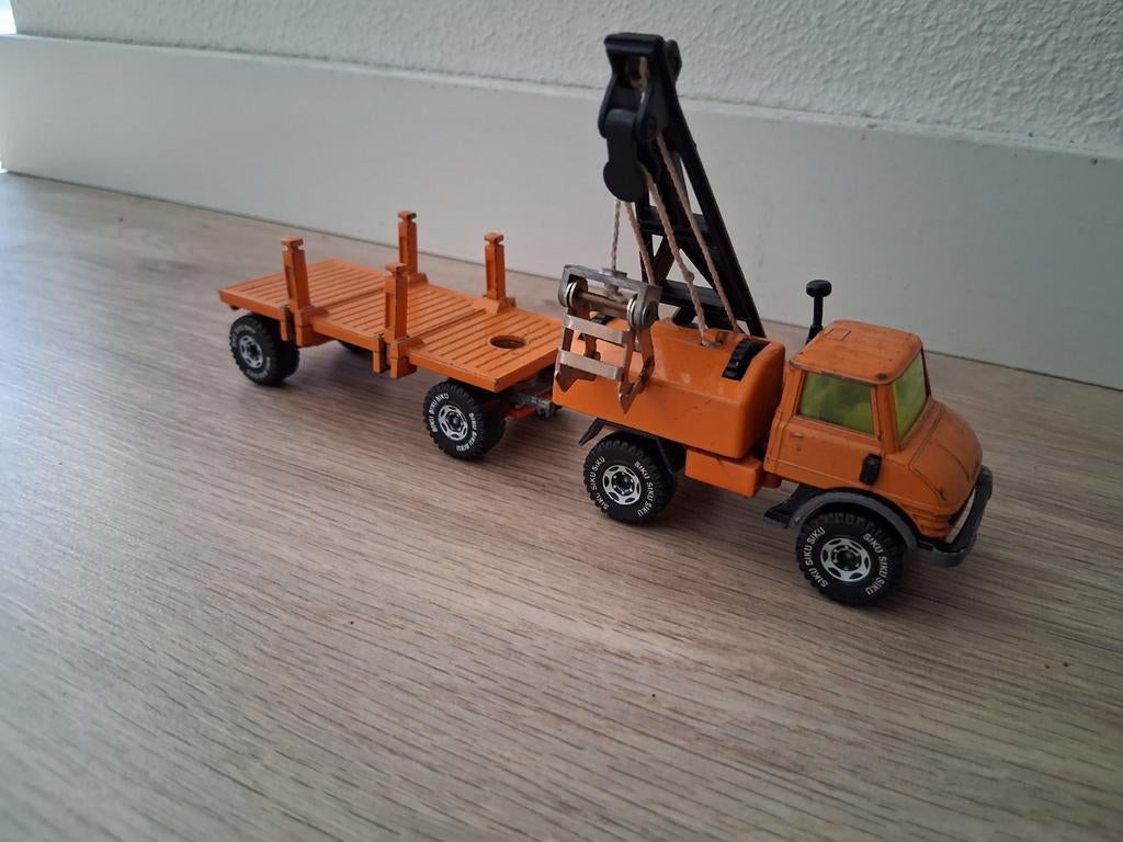 Siku unimog met buizenkar, Ophalen of Verzenden, Bus of Vrachtwagen, SIKU