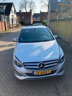 Mercedes-Benz B-Klasse 1.6 B180 5DRS BE Dct7 2016 Grijs, Auto's, Mercedes-Benz, 1325 kg, 4 cilinders, 122 pk, 1200 kg