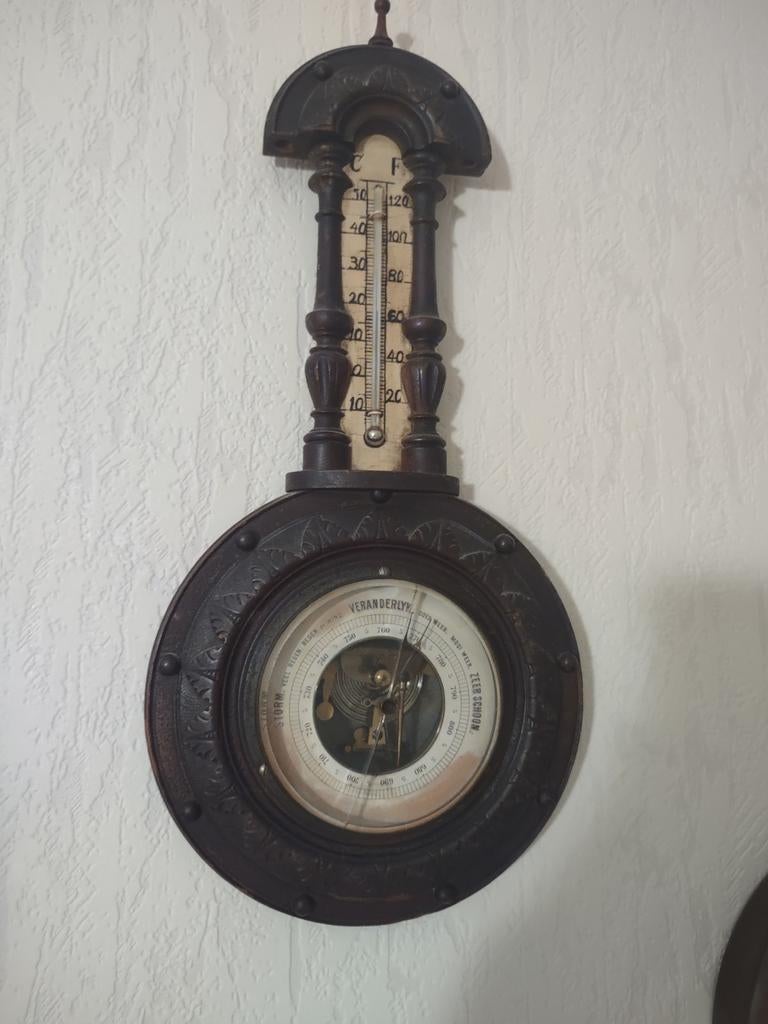 Houten barometer met thermometer, Ophalen