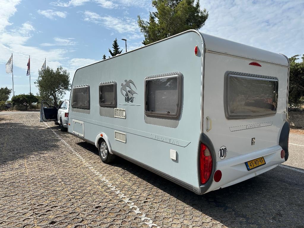 Knaus eurostar 550 incl inventaris, voortent, luifel, e-bike, Rondzit, Particulier, Schokbreker, Vast bed