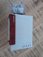 Fritzbox 7581 Router met Adapter, Ophalen of Verzenden, Gebruikt, Router met modem, Fritzbox